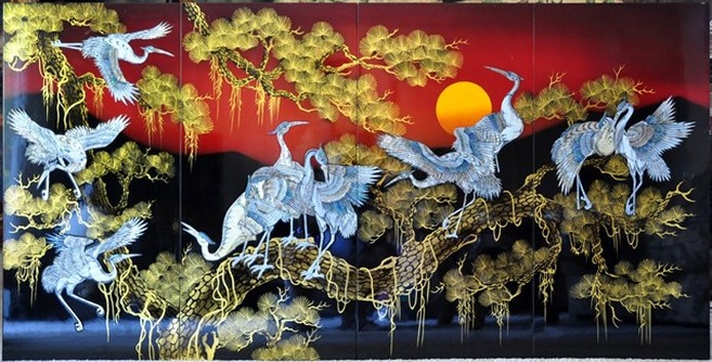 Vietnamese mother of pearl lacquer painting depicting white storks on a pine tree