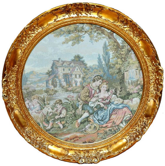 Framed round tapestry depicting a French Country scenery
