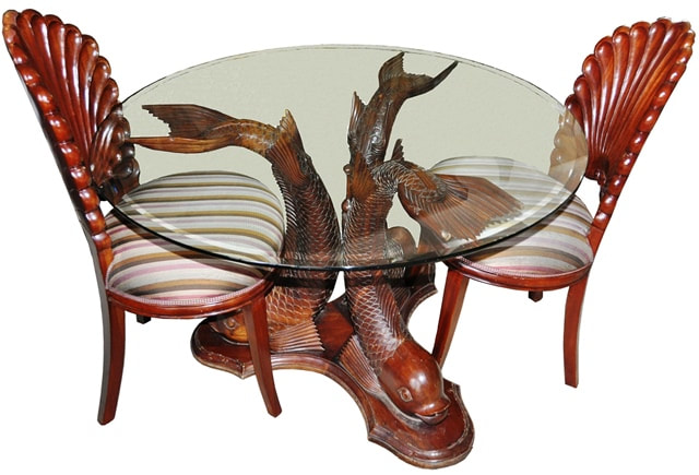 Carved teak wood koi fish base dining table and shell shaped chairs from Indonesia