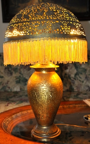 Antique table lamp with pierced brass shade and engraved vase base from India