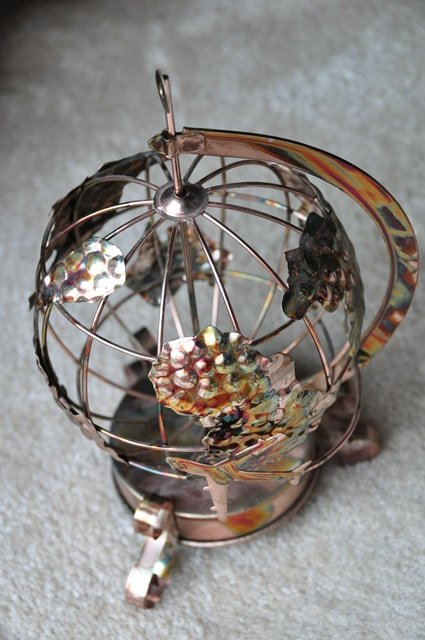 Vintage copper globe music box