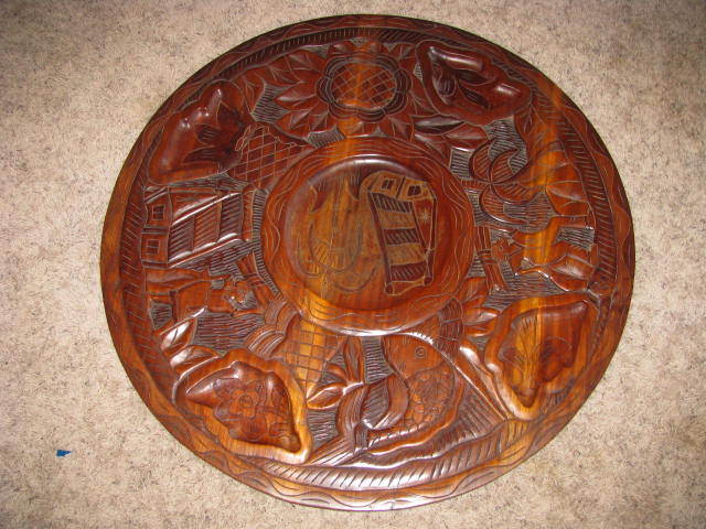 Large wood carved round plaque from Thailand