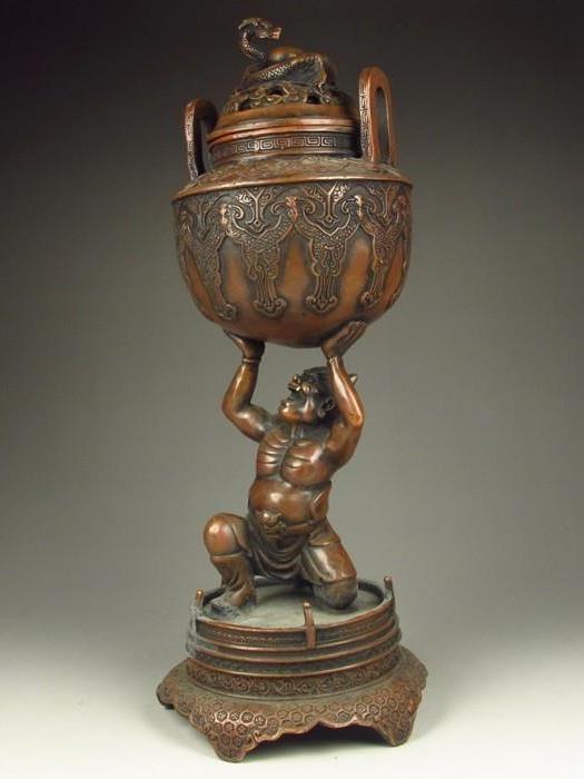 Chinese bronze incense burner with ghost and dragon sculptures