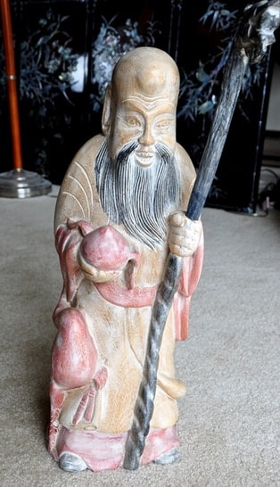 Wood carved statue of Chinese Tao God of longevity Shou Lao