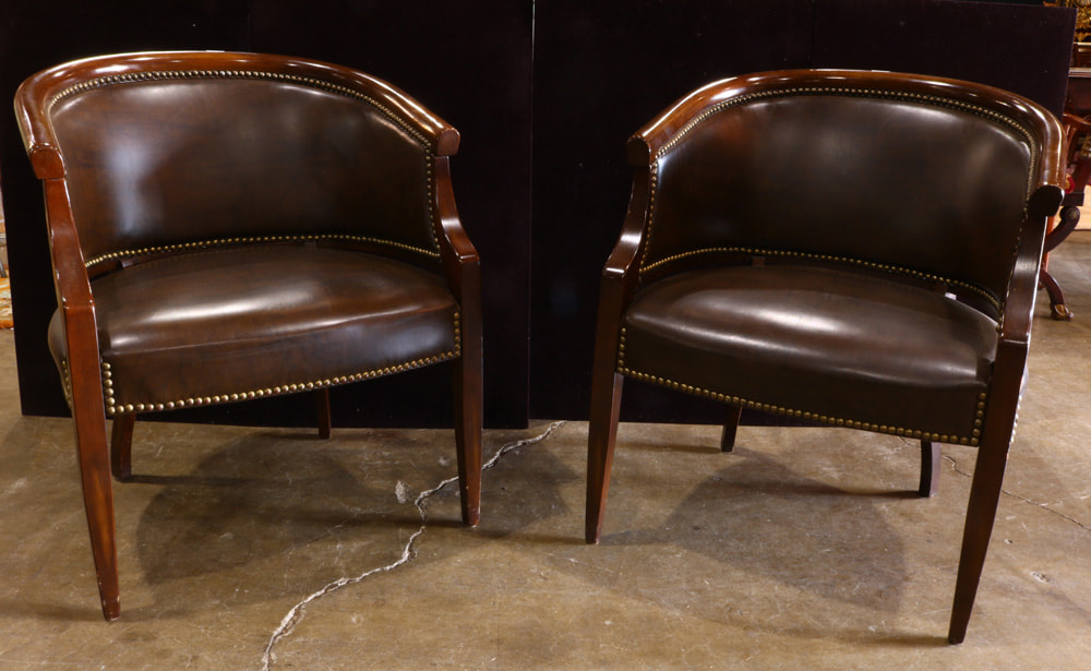 Pair of U-shaped walnut and upholstered barrel back chairs