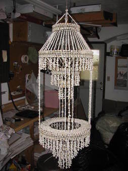 Artistic Polynesian planter in the form of a  chandelier made from sea shell