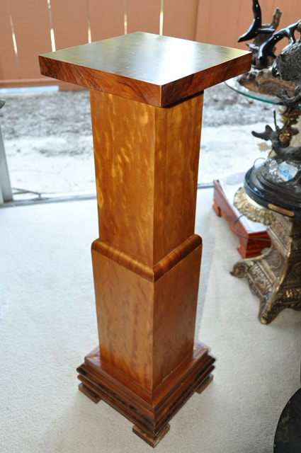 Antique wooden pedestal with square cross section