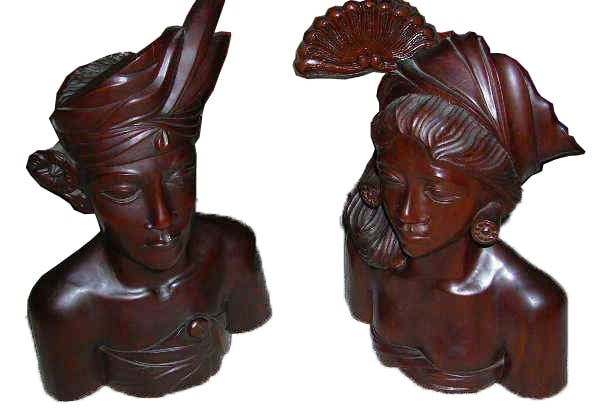 Large ironwood sculptures of man and woman from Bali, Indonesia
