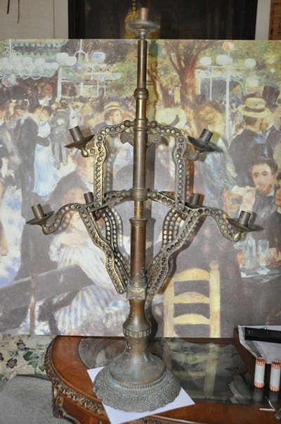 Antique Mission era foldable brass candelabra