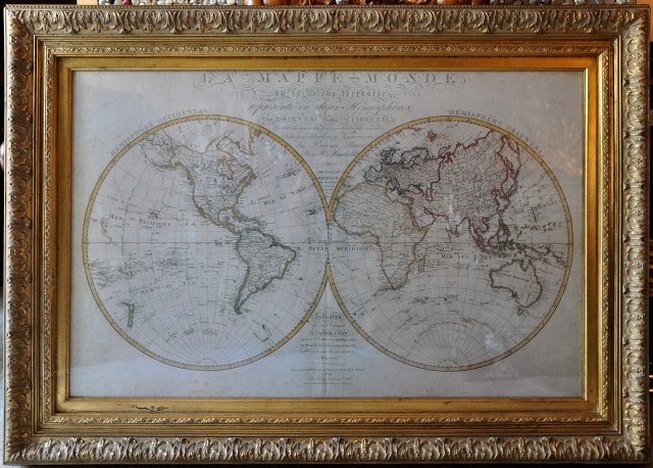 Framed 18th century French world map reproduction in ornate golden frame
