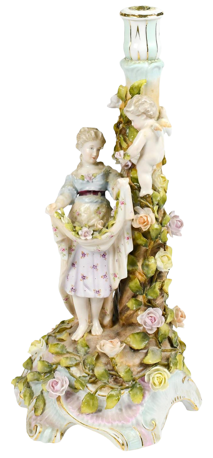German Coburg polychromed porcelain figural candlestick with floral decoration