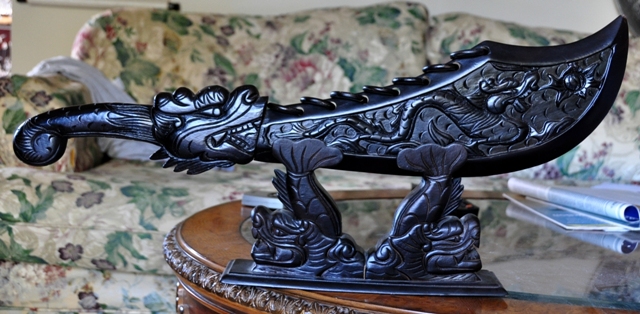 Carved wooden sword with dragon and Koi fish sculpture