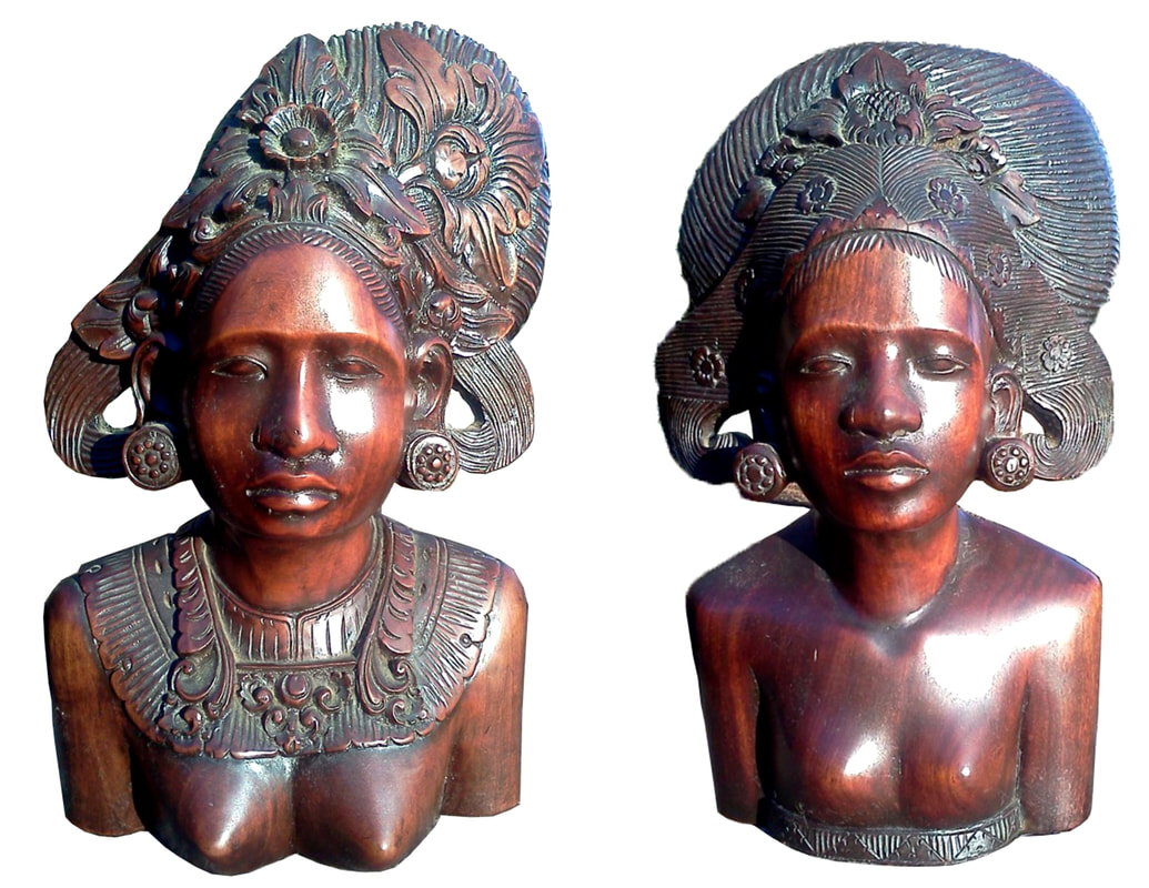 Pair of Balinese ironwood bust sculptures of women