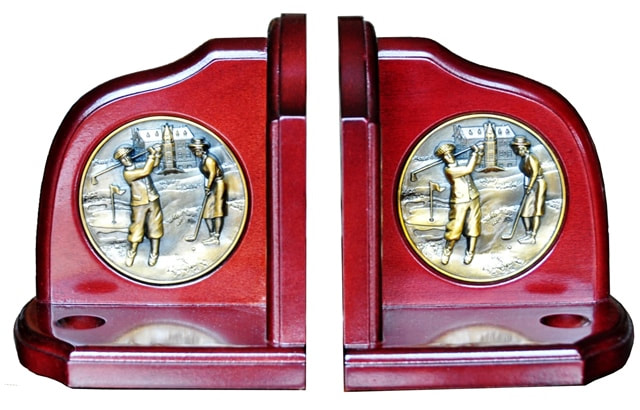 Pair of cherry colored wooden bookends with golf player medallions