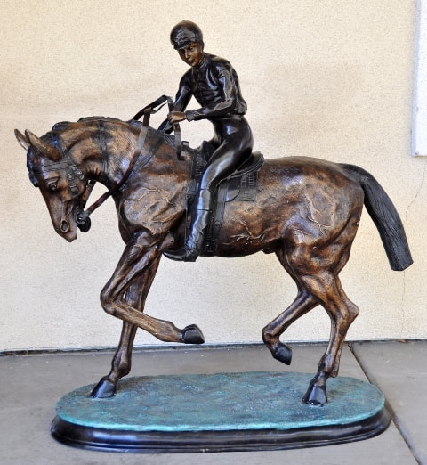 Large bronze sculpture of a jockey on horse after Pierre-Jules Mêne
