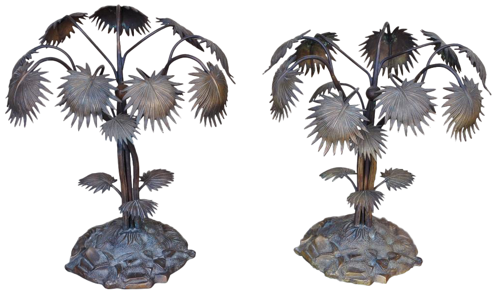 Pair of bronze sculpture of trees with broad palm like leaves
