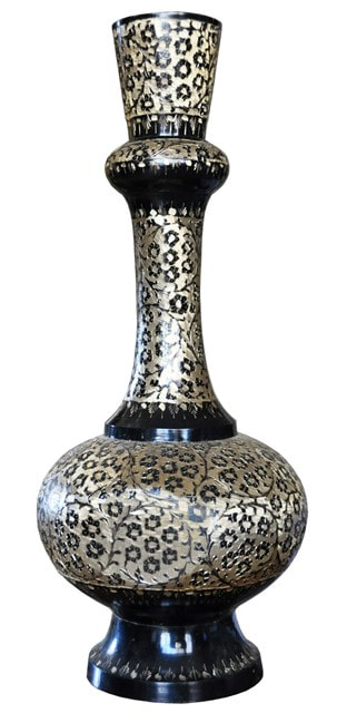 Brass vase engraved with floral patterns