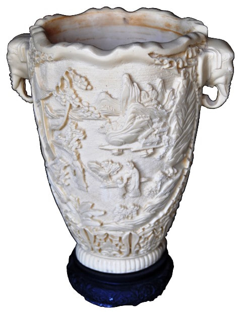Antique faux ivory vase with 3D relief carvings and elephant head handles