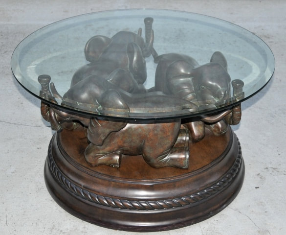 Bombay Company glass top coffee table with 3 elephant sculpture base