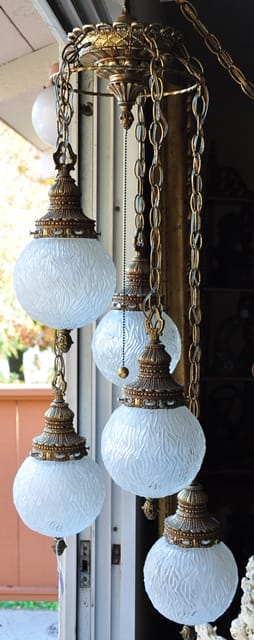 Hollywood Regency chandelier with 5 hanging glass globe lamps