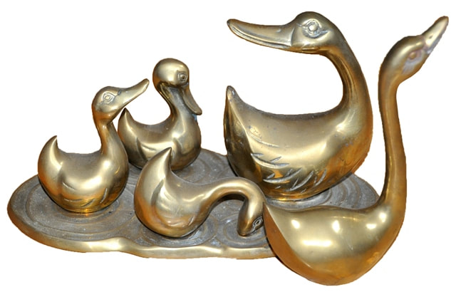 Brass duck family sculpture