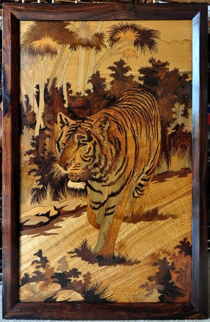 Rosewood inlay art from India depicting a tiger in the forest