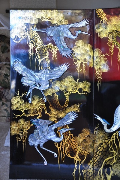 Vietnamese mother of pearl lacquer painting depicting white cranes on a