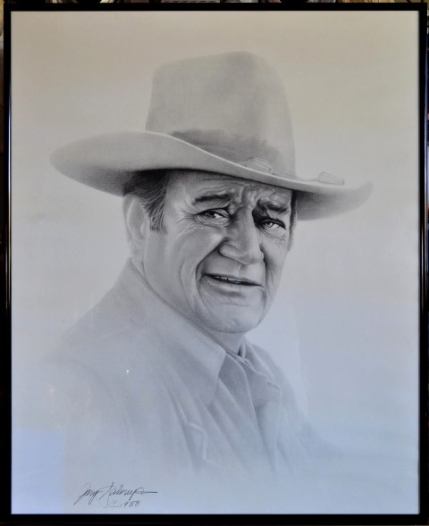 Framed print of 1988 charcoal drawing of John Wayne by Gary Saderup