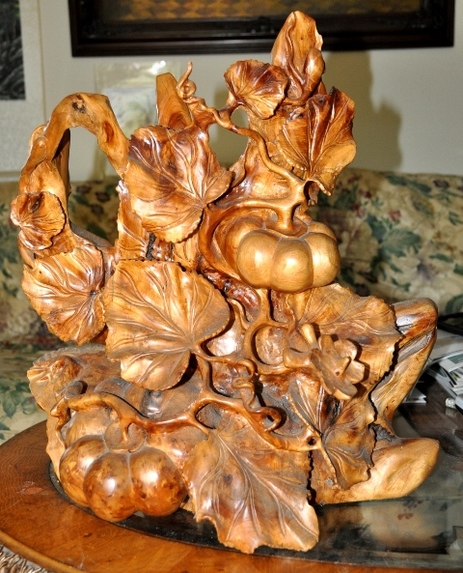 Pumpkins on vine sculpture carved from a single piece of wood