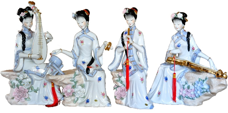 Set of 4 porcelain figurines of beautiful Oriental ladies playing various musical instruments