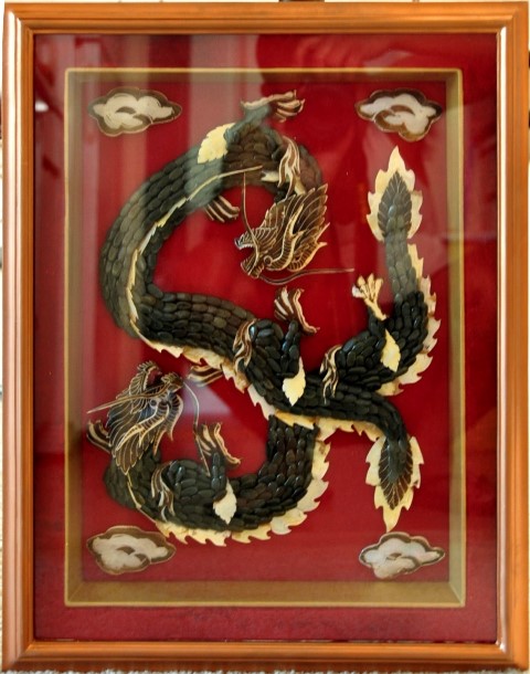 Burmese gemstone inlay artwork depicting two dragons