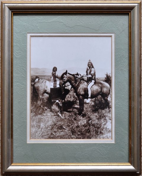 Framed photo titled Ute Warrior and Bride taken by John Hillers in 1874