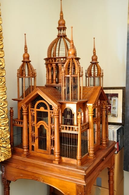 Monumental Victorian style wooden bird cage on a stand