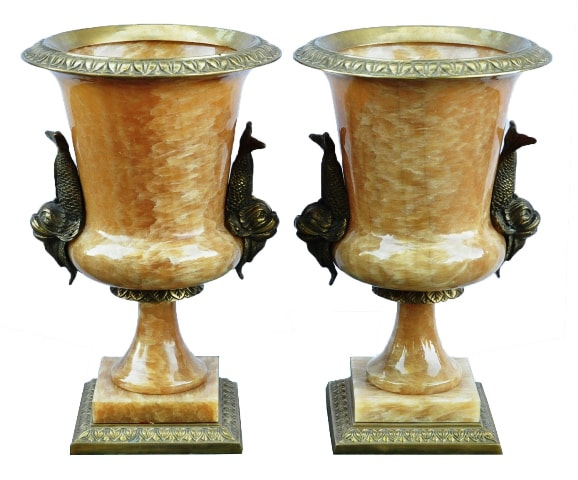 Pair of carved alabaster urns with dolphin handles