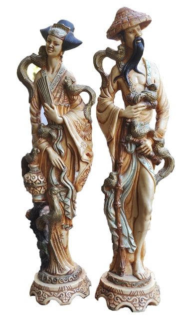 Matching pair of 20 inch tall faux ivory statues of a geisha and a daimyo
