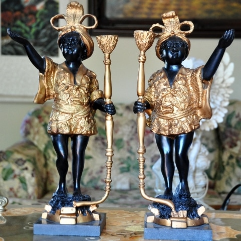 Pair of gilt blackamoor greeter figural candlesticks