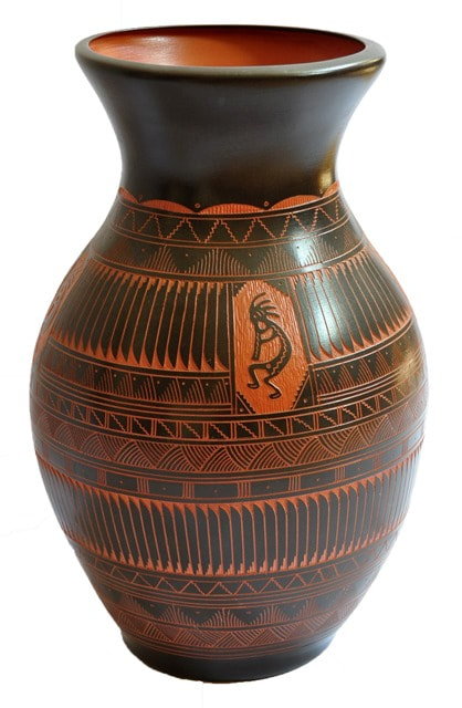 Large brown colored Navajo ceramic vase with hand etched Kokopellis and other patterns