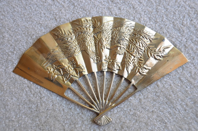 Brass fans with phoenix engraving