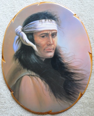 Portrait of Native American on oval wooden board