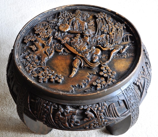 Antique Chinese accent table with 3D relief wood carvings 