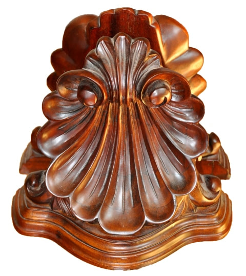 Pair of shell shaped carved mahogany bookends by Selamat Designs