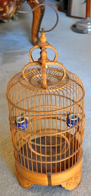 Artistic Asian bamboo bird cage with porcelain feeders