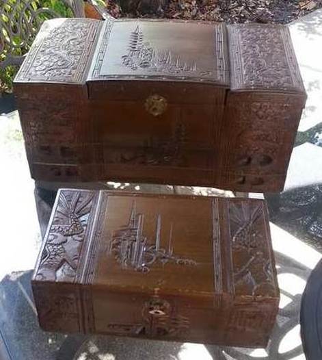 Pair of antique Oriental wooden jewelry boxes with carved artwork