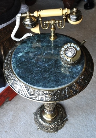French telephone on green marble top brass table with engraved artwork