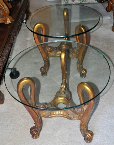 Pair of rare glass top end tables with wooden bases having legs in the shape of swan necks