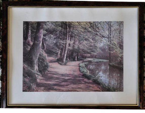 Framed print showing some children in the forest