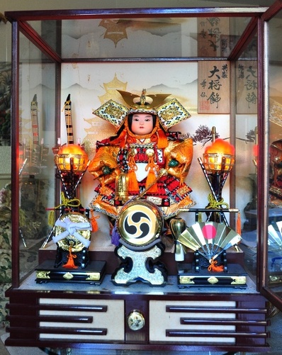 Large Japanese Samurai doll with music box in glass case