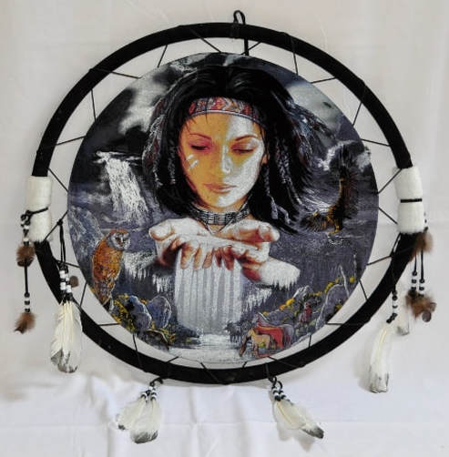 Native American dreamcatcher with painting of a woman holding water, birds and animals
