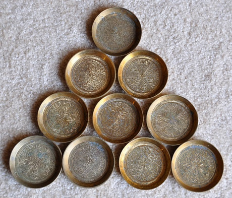 Set of 10 beautiful miniature engraved brass trays from India
