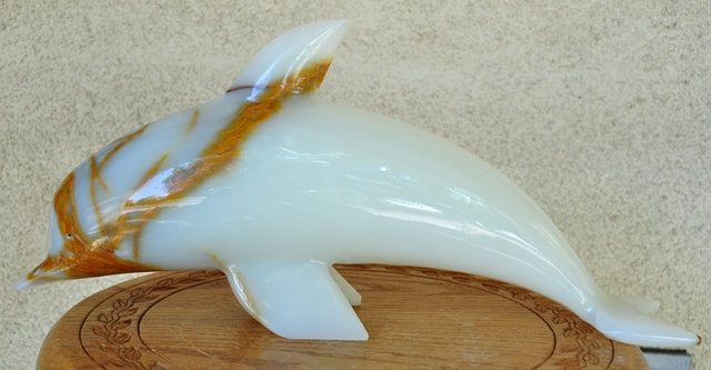 Vintage carved hardstone sculpture of a dolphin